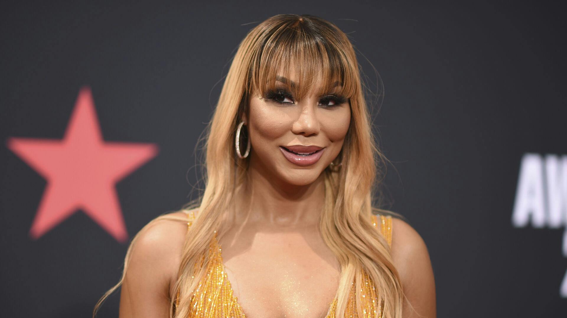 Den amerikanske sanger Tamar Braxton afviser nu, at hun skulle have haft en affære med storesøsterens mand.