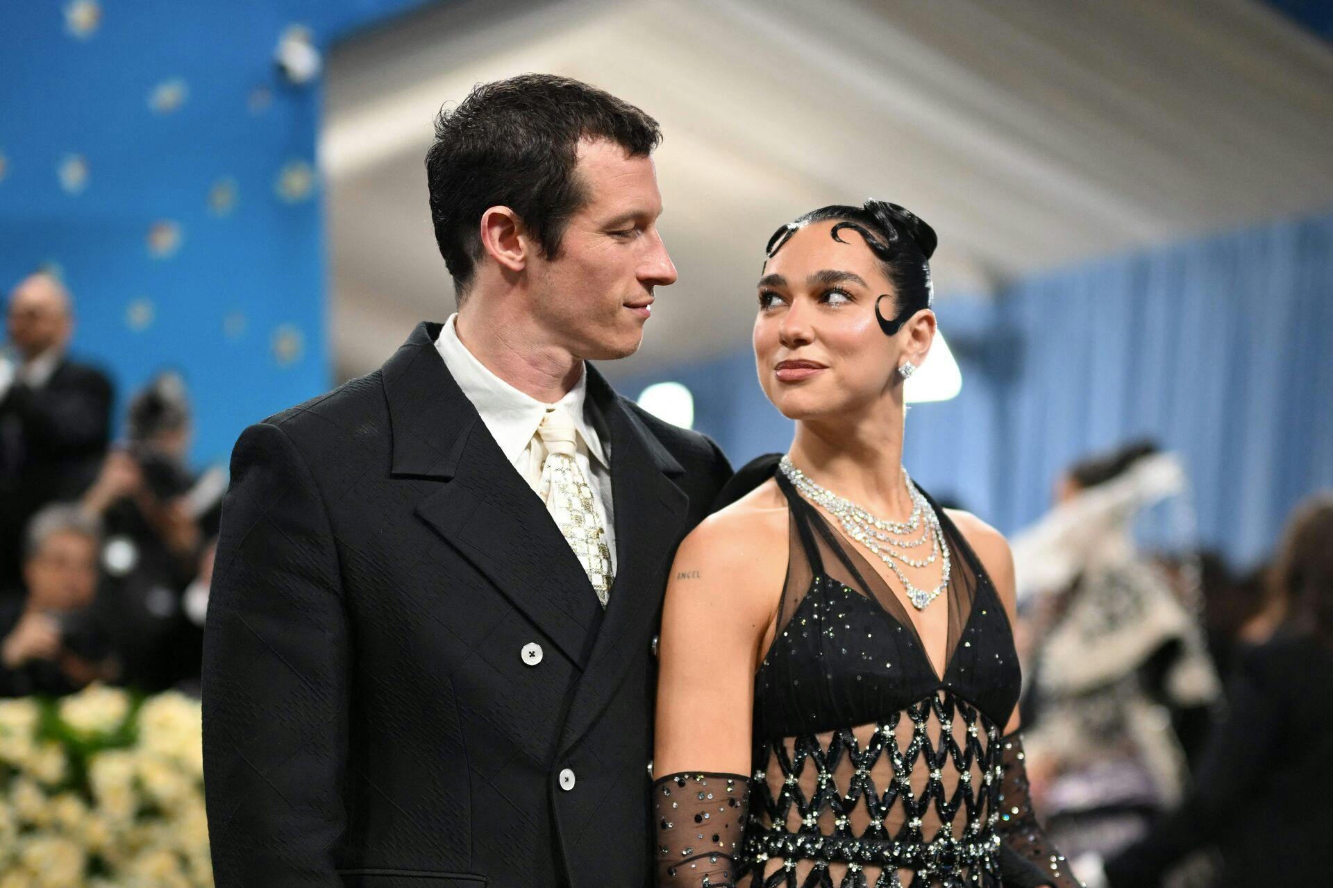 TOPSHOT - British-Albanian singer-songwriter Dua Lipa (R) and British actor Callum Turner arrive for the 2025 Met Gala at the Metropolitan Museum of Art on May 5, 2025, in New York. The Gala raises money for the Metropolitan Museum of Art's Costume Institute. The 2025 Met Gala is themed "Tailored for You, " aligning with the Costume Institute's exhibition, "Superfine: Tailoring Black Style, " set to open to the public on May 10. (Photo by ANGELA WEISS / AFP)