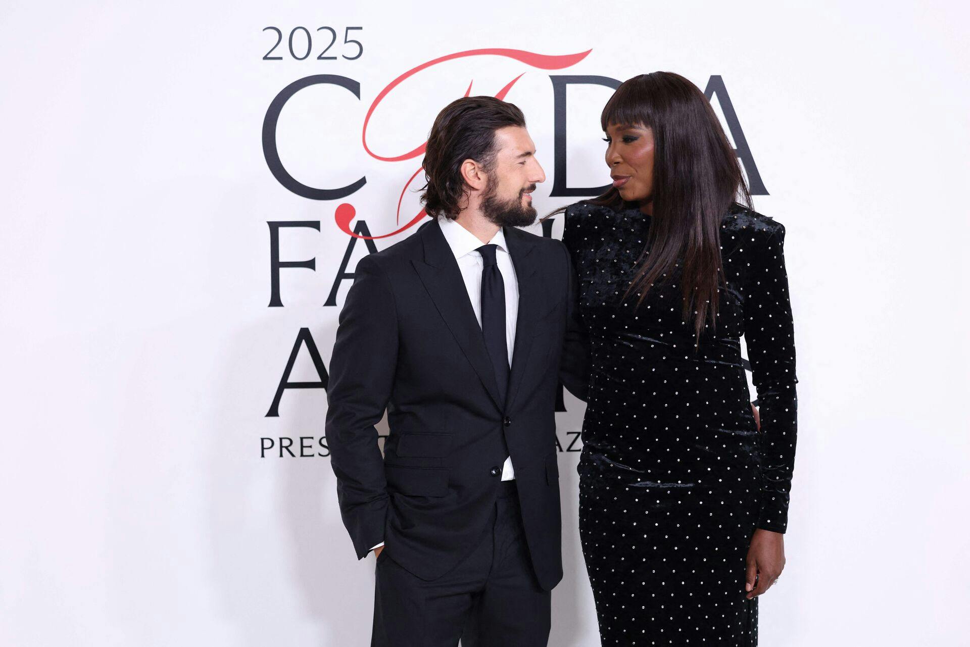 US tennis player Venus Williams (R) and fiancé Andrea Preti attends the CFDA (Council of Fashion Designers of America) Fashion Awards at the American Museum of Natural History in New York on November 3, 2025. (Photo by CHARLY TRIBALLEAU / AFP)
