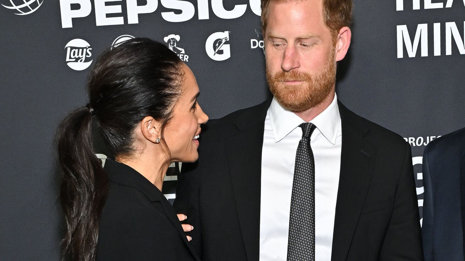 Meghan Markle, left, and Prince Harry, The Duke and Duchess of Sussex, attend the third annual World Mental Health Day Gala, hosted by Project Healthy Minds, at Spring Studios on Thursday, Oct. 9, 2025, in New York. (Photo by Evan Agostini/Invision/AP)