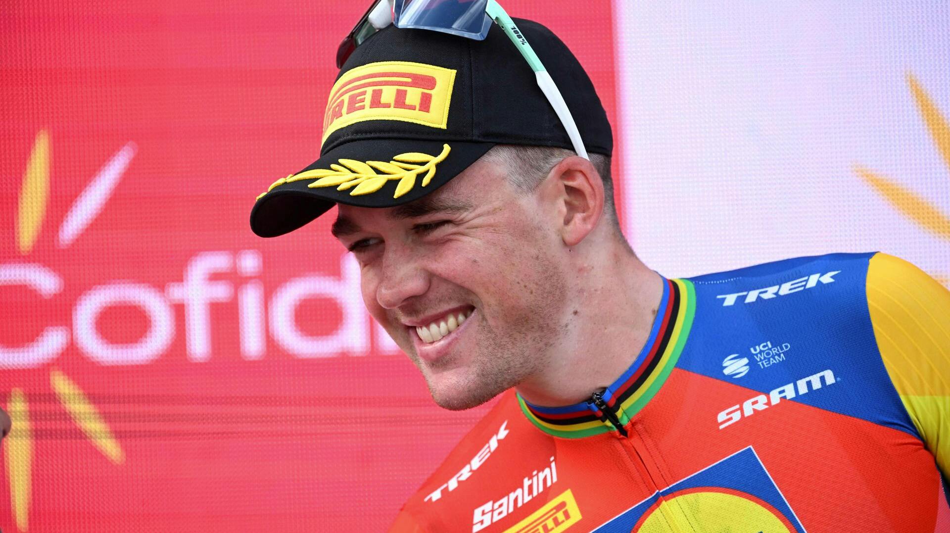 Stage winner Team Lidl-Trek's Danish rider Mads Pedersen celebrates on the podium after the 15th stage of the Vuelta a Espana cycling tour, a 167 km race between A Veiga/Vegaredo and Monforte de Lemos, on September 7, 2025. (Photo by Miguel RIOPA / AFP)