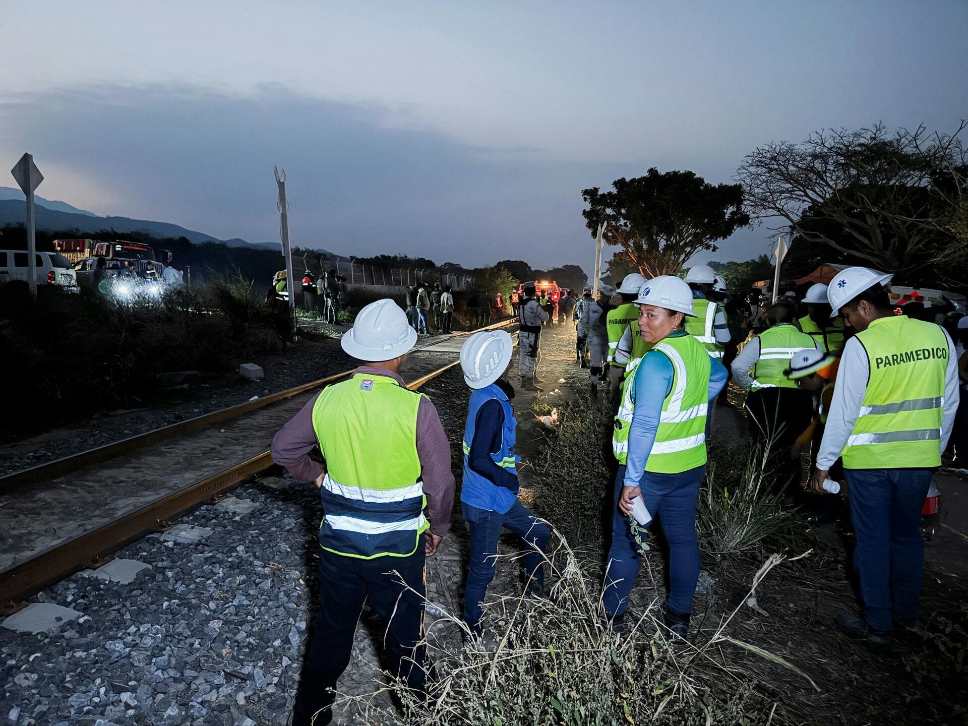 Authorities work at the site of train derailment on the Interoceanic Corridor of the Isthmus of Tehuantepec, a railway line connecting Mexico's Pacific and Gulf coasts, where several passengers were killed and injured near Nizanda, Oaxaca state, Mexico, December, 28, 2025. REUTERS/Jose de Jesus Cortes
