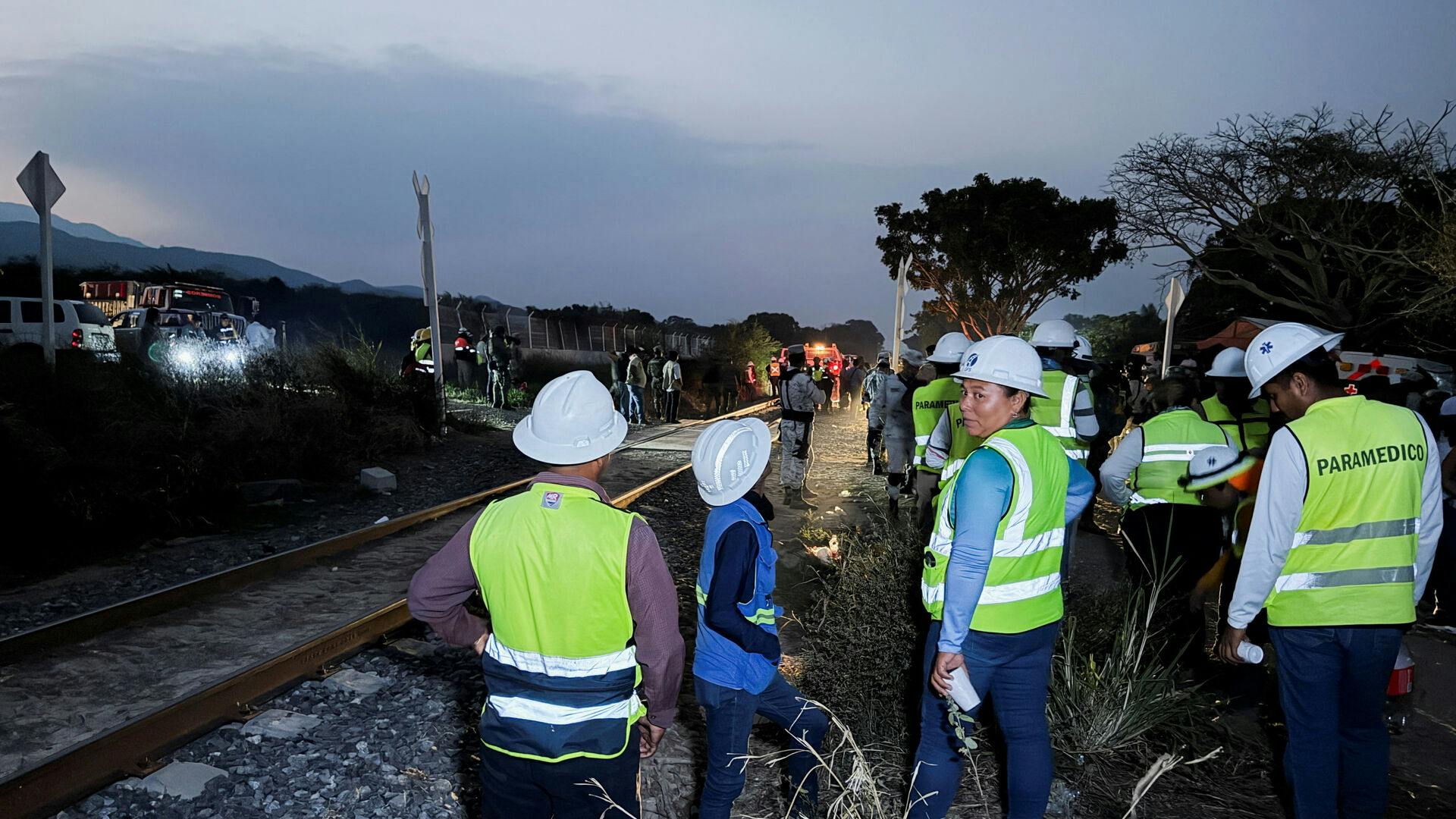 Authorities work at the site of train derailment on the Interoceanic Corridor of the Isthmus of Tehuantepec, a railway line connecting Mexico's Pacific and Gulf coasts, where several passengers were killed and injured near Nizanda, Oaxaca state, Mexico, December, 28, 2025. REUTERS/Jose de Jesus Cortes