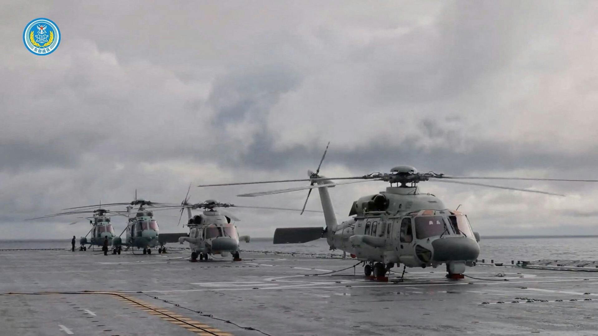 Helicopters on an amphibious assault ship take part in military drills in waters southeast of Taiwan, in this screenshot from a video released by the Eastern Theatre Command of China's People's Liberation Army (PLA), December 29, 2025. Eastern Theatre Command/Handout via REUTERS ATTENTION EDITORS - THIS IMAGE WAS PROVIDED BY A THIRD PARTY. MANDATORY CREDIT.NO RESALES.NO ARCHIVES.