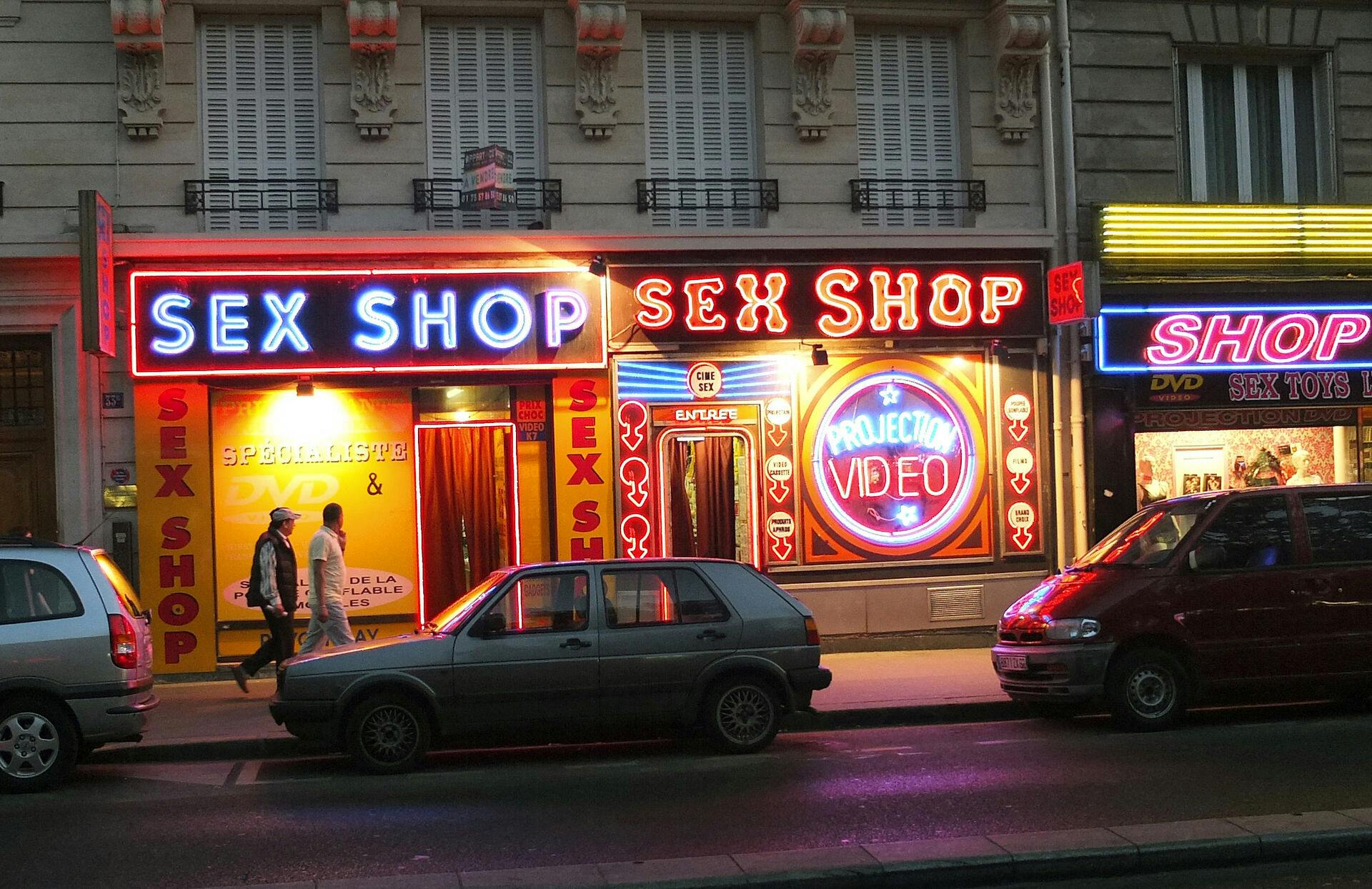 A photography taken on July 11, 2013 shows sexshops on the Rochechouart boulevard at the Pigalle district in Paris. AFP PHOTO / PATRICK KOVARIK. PATRICK KOVARIK / AFP