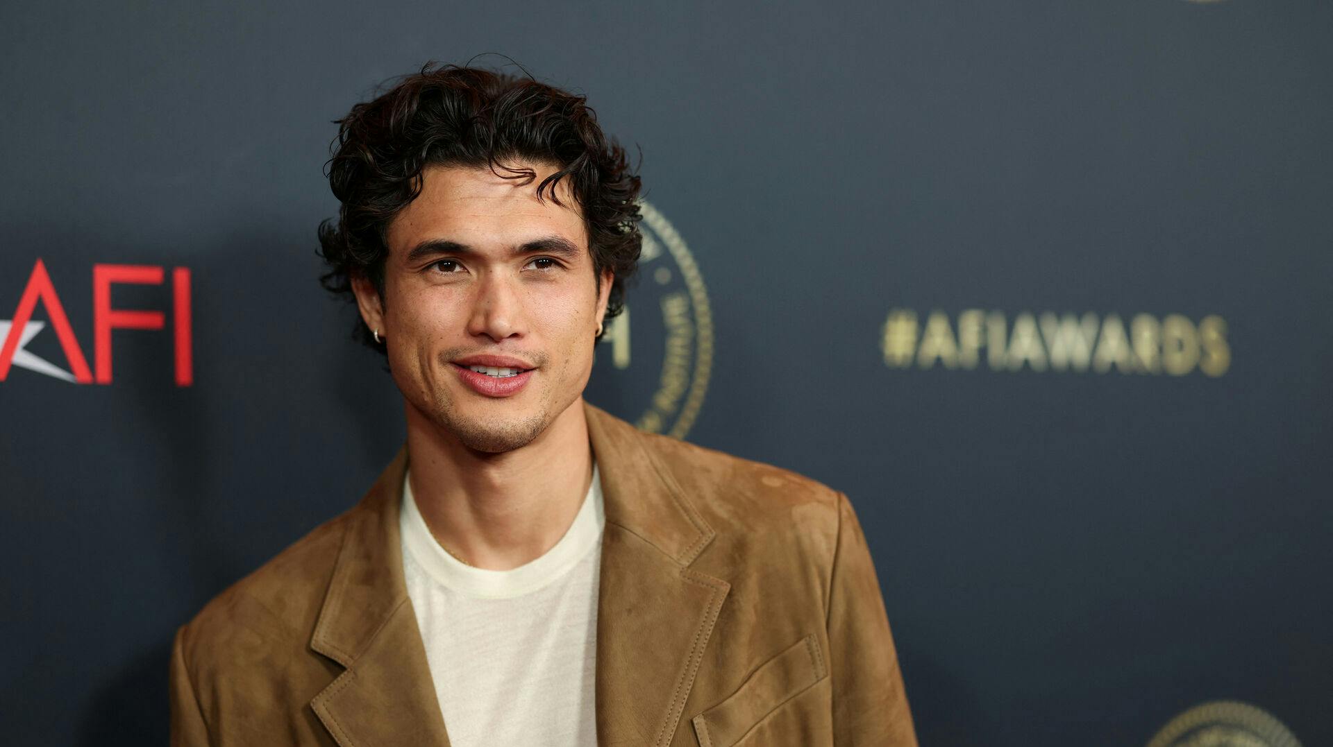 Charles Melton attends the AFI (American Film Institute) Awards Luncheon in Los Angeles, California, U.S., January 12, 2024. REUTERS/Mario Anzuoni REFILE - CORRECTING EVENT FROM "AFI AWARDS" TO "AFI AWARDS LUNCHEON".