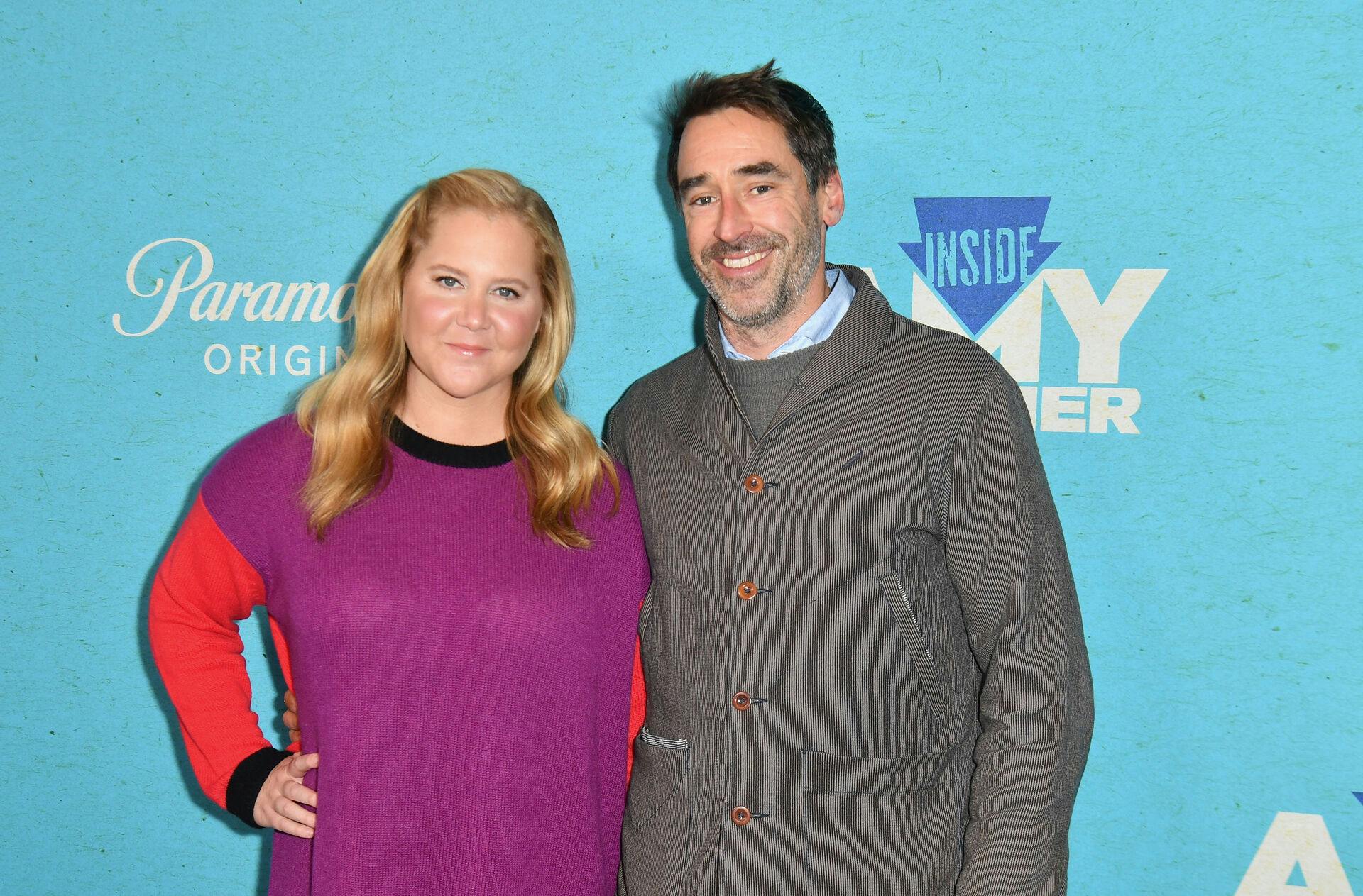 US actress and comedian Amy Schumer and her husband chef Chris Fischer arrive for the season five New York premiere of Inside Amy Schumer, at the Pendry Hotel in New York City on October 18, 2022. ANGELA WEISS / AFP