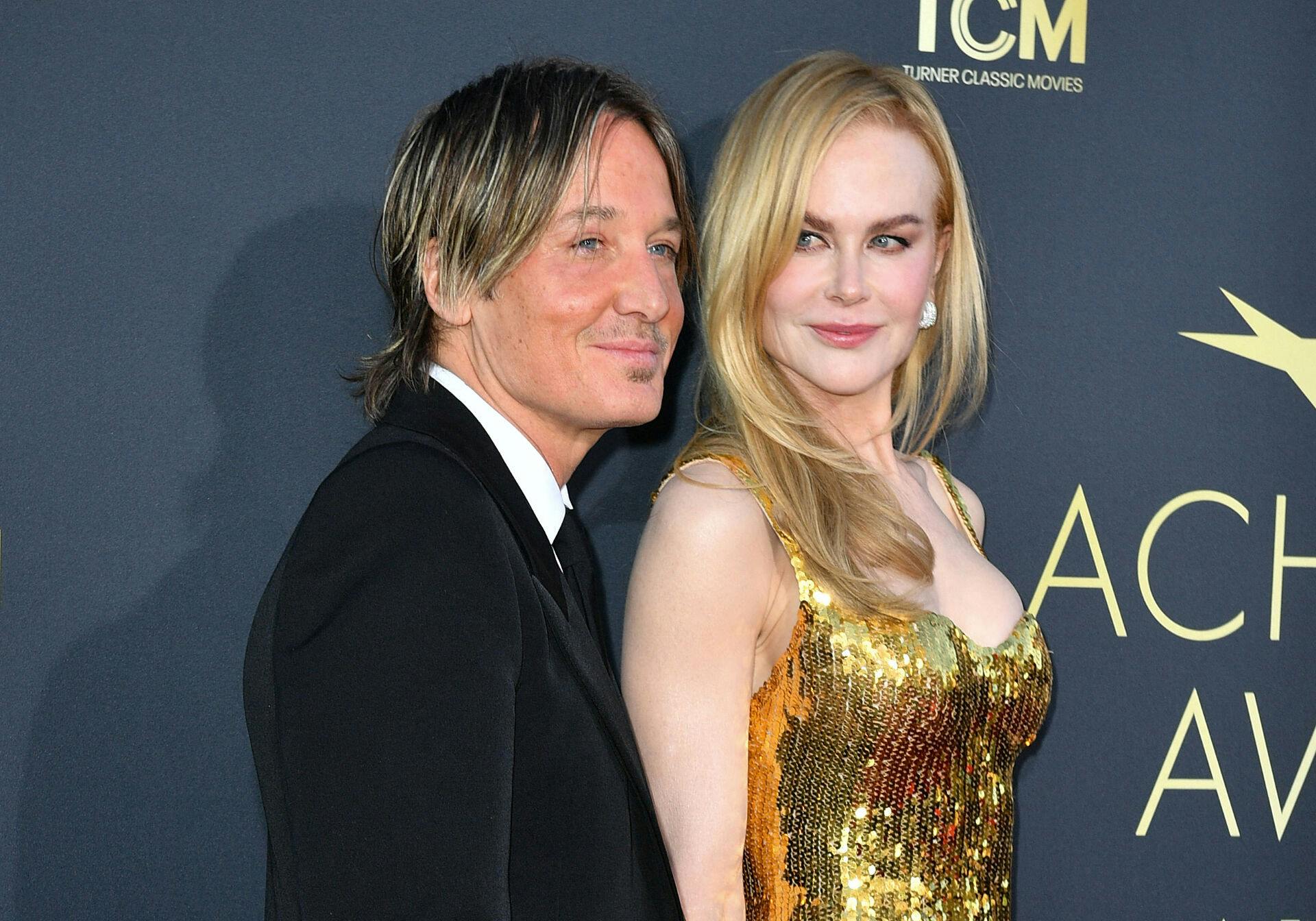 Australian musician Keith Urban (L) and Australian actress Nicole Kidman attend the 49th AFI Life Achievement Award honoring Nicole Kidman at the Dolby Theatre in Hollywood, California, on April 27, 2024.                                               VALERIE MACON / AFP