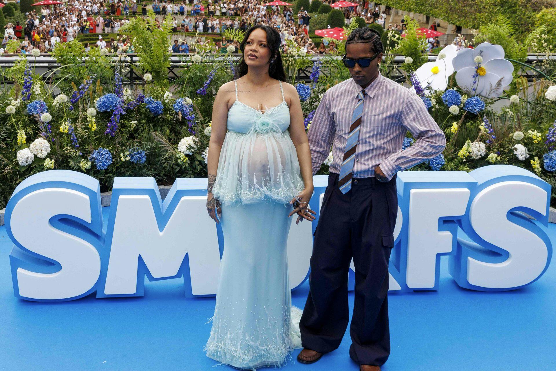 US actress Rihanna (L) and ASAP Rocky pose during the world premier of the new film "Les Schtroumpfs" (The Smurfs) in Brussels on June 28, 2025. (Photo by NICOLAS MAETERLINCK / Belga / AFP) / Belgium OUT