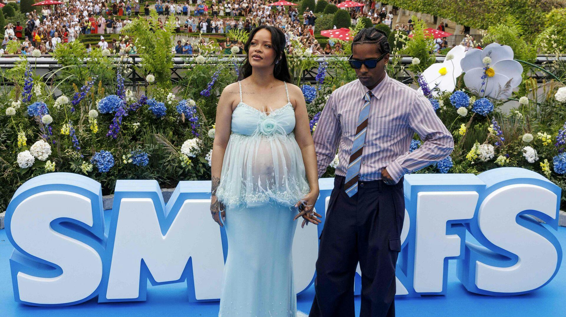 US actress Rihanna (L) and ASAP Rocky pose during the world premier of the new film "Les Schtroumpfs" (The Smurfs) in Brussels on June 28, 2025. (Photo by NICOLAS MAETERLINCK / Belga / AFP) / Belgium OUT
