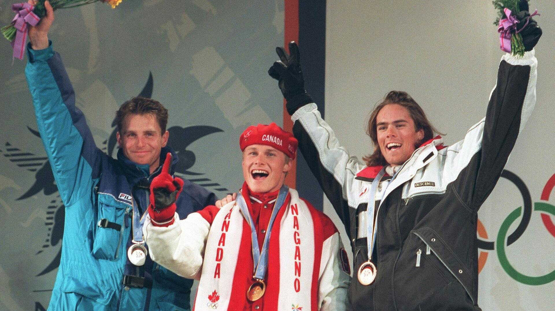 Ueli Kestenholz (til højre), der i 1998 fejrer sin bronzemedalje ved OL.