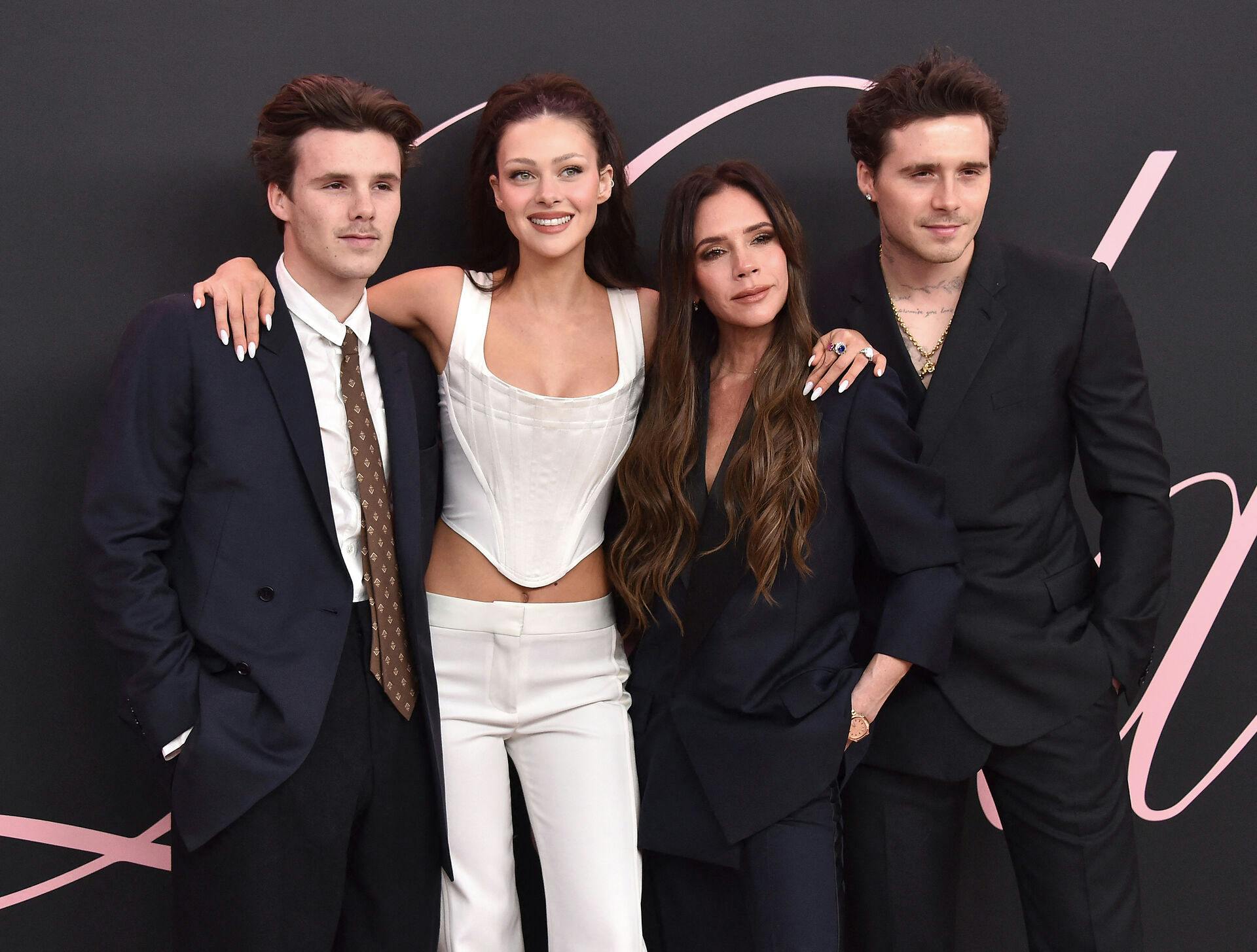 (From R) Former British model Brooklyn Beckham, British fashion designer and singer Victoria Beckham, US actress Nicola Peltz Beckham and British singer Cruz Beckham arrive for the premiere of the movie "Lola" at the Bruin Theatre, in Los Angeles, California on February 3, 2024. LISA O'CONNOR / AFP