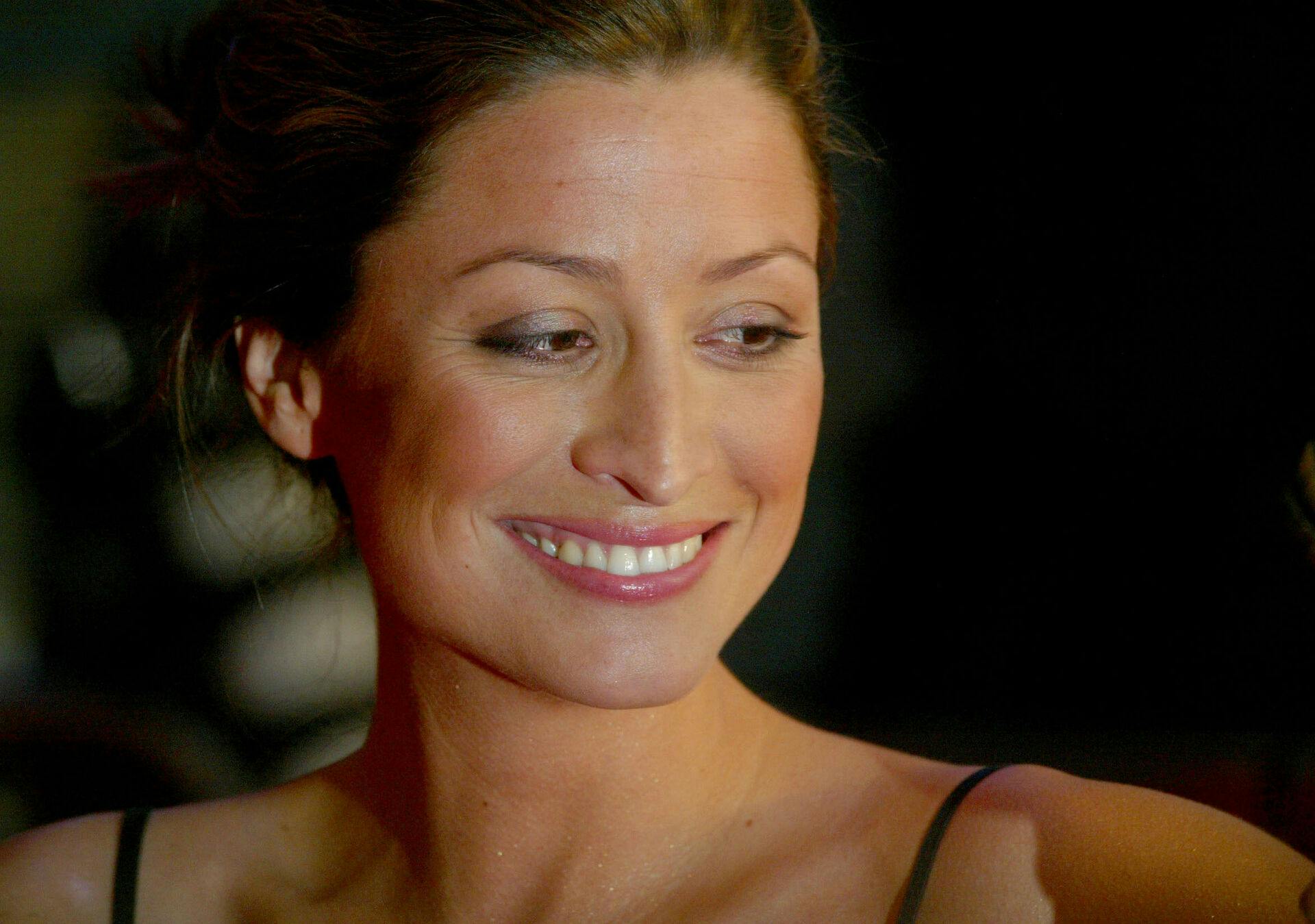 David Beckham's former personal assistant, Rebecca Loos, arrives at the UK premiere of'Kill Bill Volume 2' at the Empire Leicester Square in London, April 20, 2004. REUTERS/Matt Dunham'