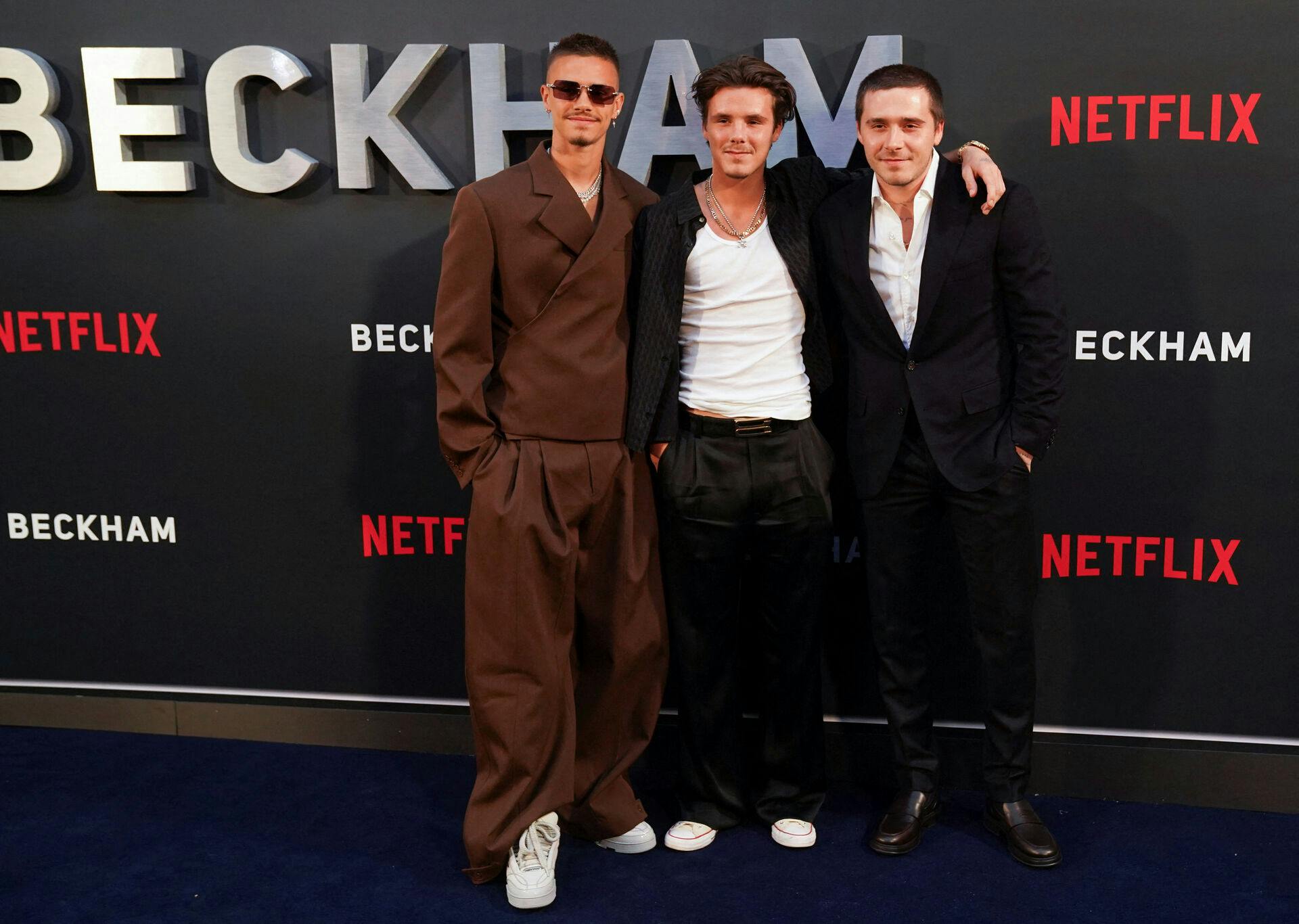 David Beckham's sons Brooklyn Peltz Beckham, Cruz Beckham and Romeo Beckham arrive to the premiere of a Netflix documentary called 'Beckham' in London, Britain October 3, 2023. REUTERS/Maja Smiejkowska