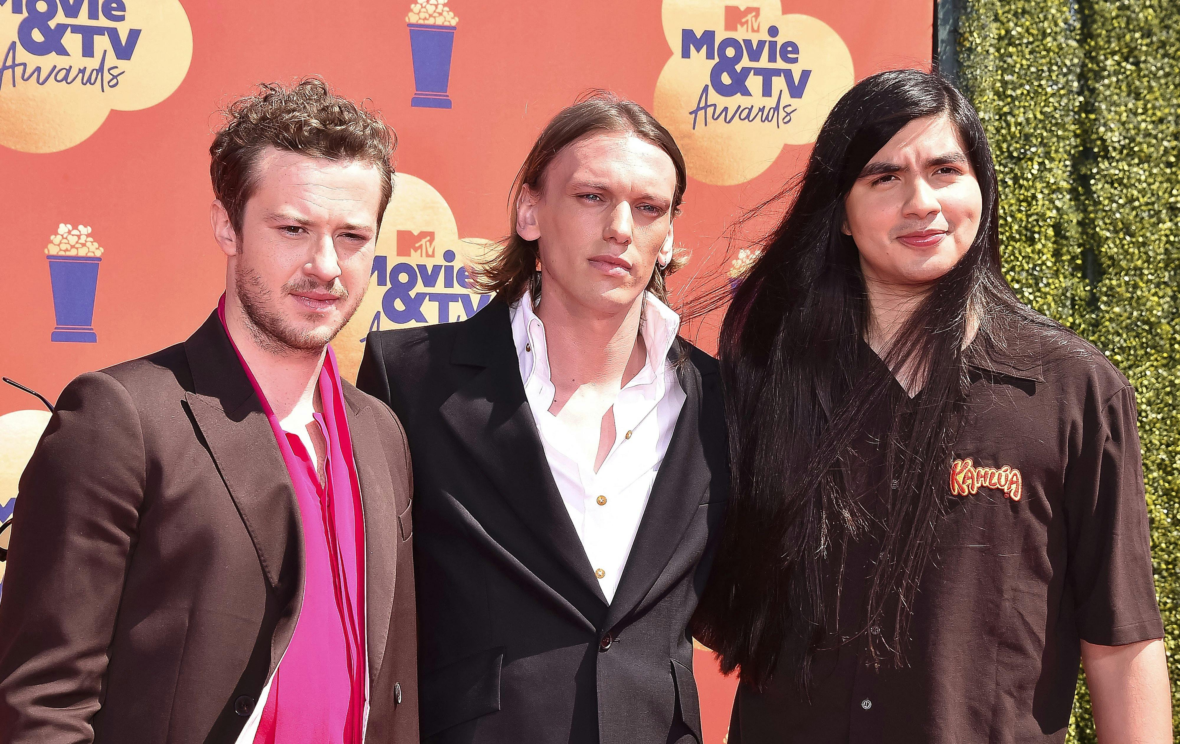 Tom Blyth attends the 2022 MTV Movie and TV Awards at Barker Hangar in Santa Monica, Los Angeles, USA, on 05 June 2022. Photo: Vinnie Levine. 05 Jun 2022 Pictured: (l-r) Joseph Quinn, Jamie Campbell Bower and Eduardo Franco attends the 2022 MTV Movie and TV Awards at Barker Hangar in Santa Monica, Los Angeles, USA, on 05 June 2022. Photo: Vinnie Levine. Photo credit: MEGA TheMegaAgency.com +1 888 505 6342 (Mega Agency TagID: MEGA865914_005.jpg) [Photo via Mega Agency]