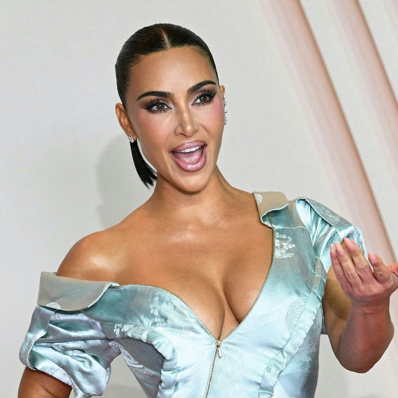 TOPSHOT - US reality TV personality Kim Kardashian poses during a photocall for the premiere of "All's Fair" TV series in Paris on October 21, 2025. (Photo by Bertrand GUAY / AFP)
