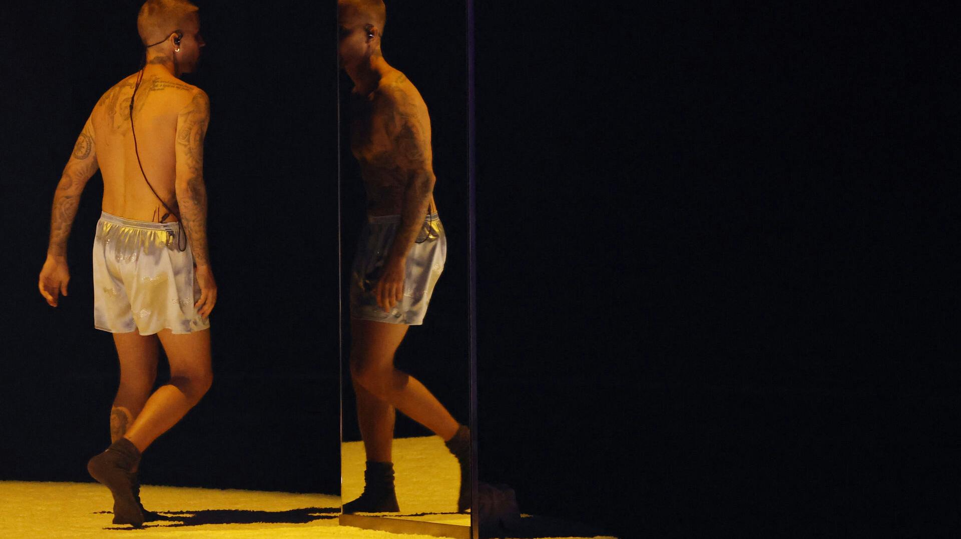 Justin Bieber walks on stage during his performance at the 68th Annual Grammy Awards in Los Angeles, California, U.S., February 1, 2026. REUTERS/Daniel Cole