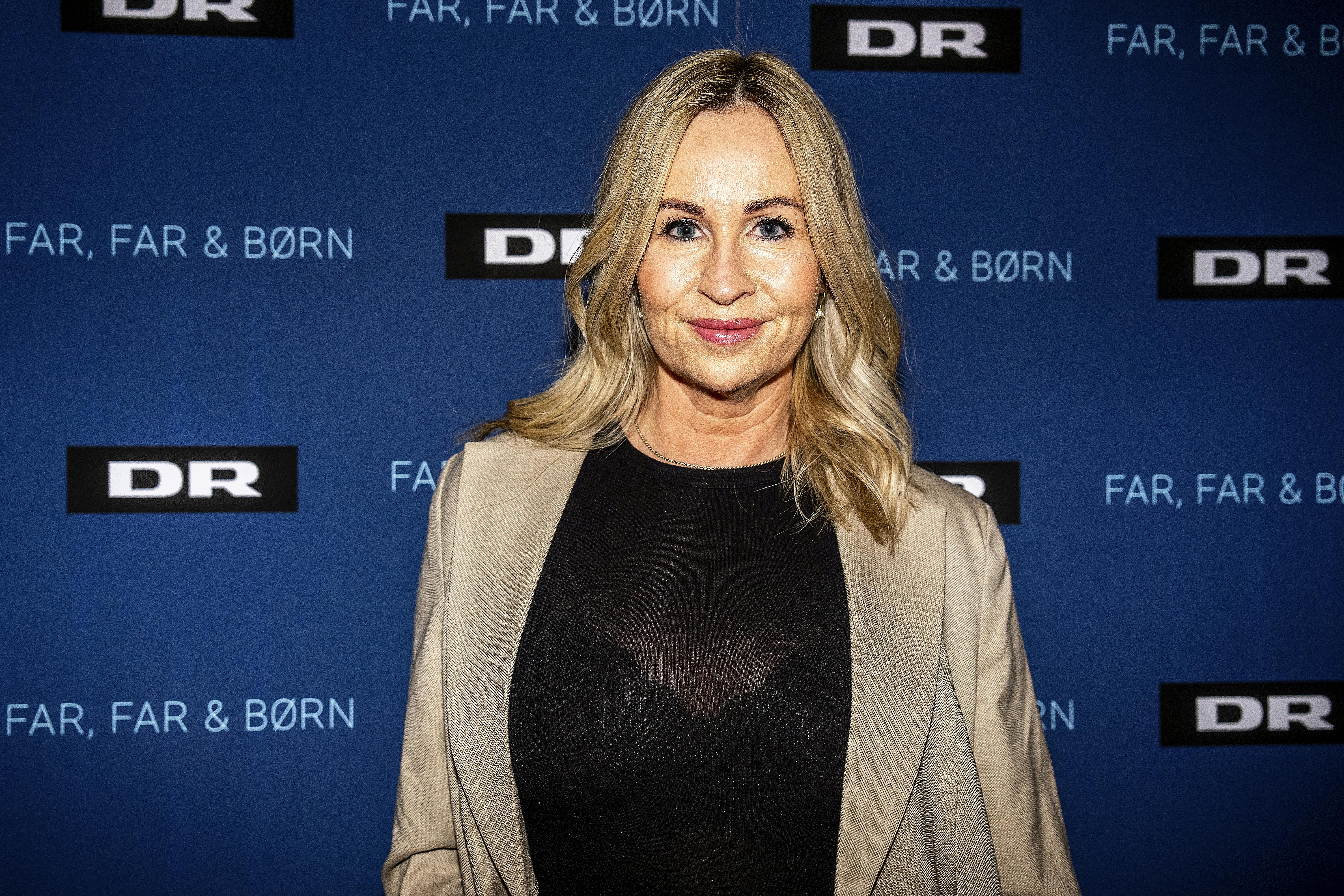 Joan Divine er fotograf og kosmetolog samt tidligere Side 9-pige og model.