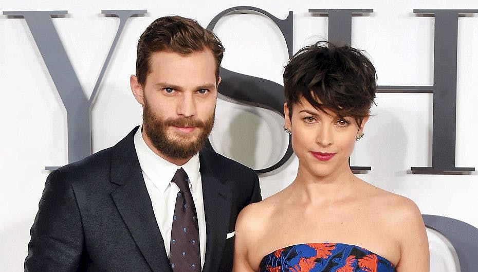 Jamie Dornan med konen, Amelia Warner, der efter sigende skulle være lidt for jaloux til, at gemalen må spille med i den næste film.