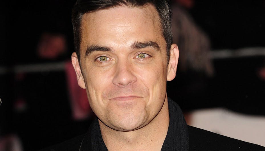 Robbie Williams holdt sig ikke tilbage på pressemødet sent fredag aften