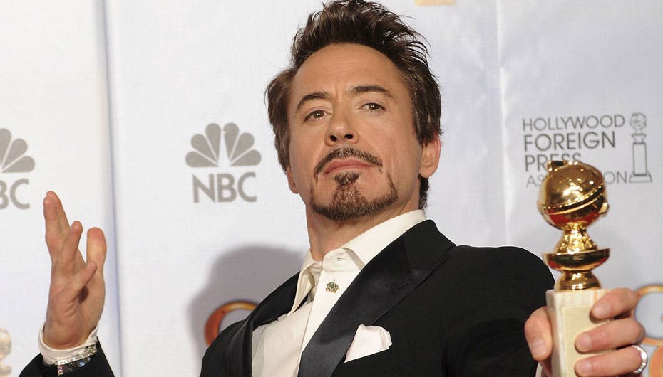 Robert Downey Jr. kunne slet ikke få armene ned efter sin triumf for filmen "Sherlock Holmes"