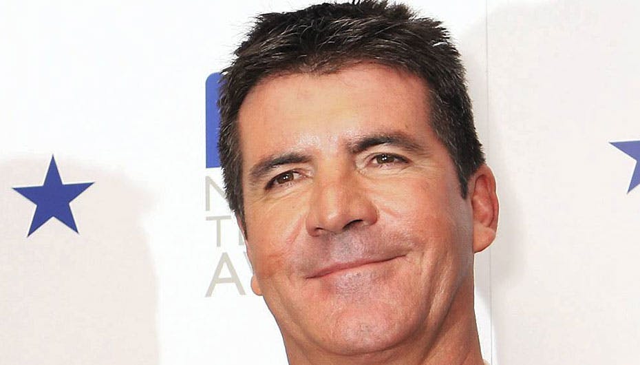 Simon Cowell har taget fusen på alle ved at forlove sig med den 14 år yngre Mezhgan