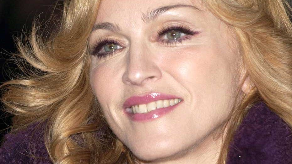 Madonna smiler efter at have været sammen med sin gamle flamme i weekenden