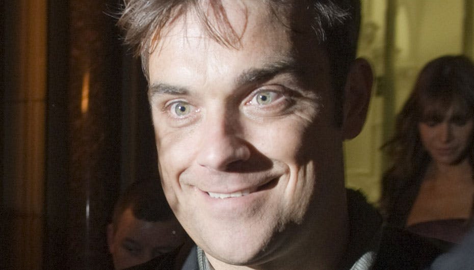 Robbie Williams er inde i Take That-varmen igen